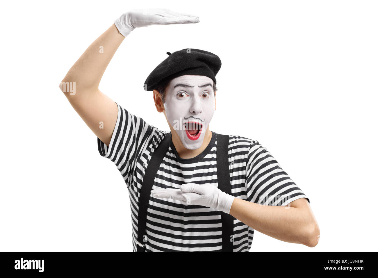 Artiste mime des gestes avec ses mains isolé sur fond blanc Banque D'Images