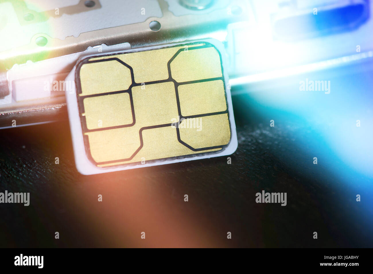 Close-up of micro carte SIM. Image avec flare bleu Banque D'Images