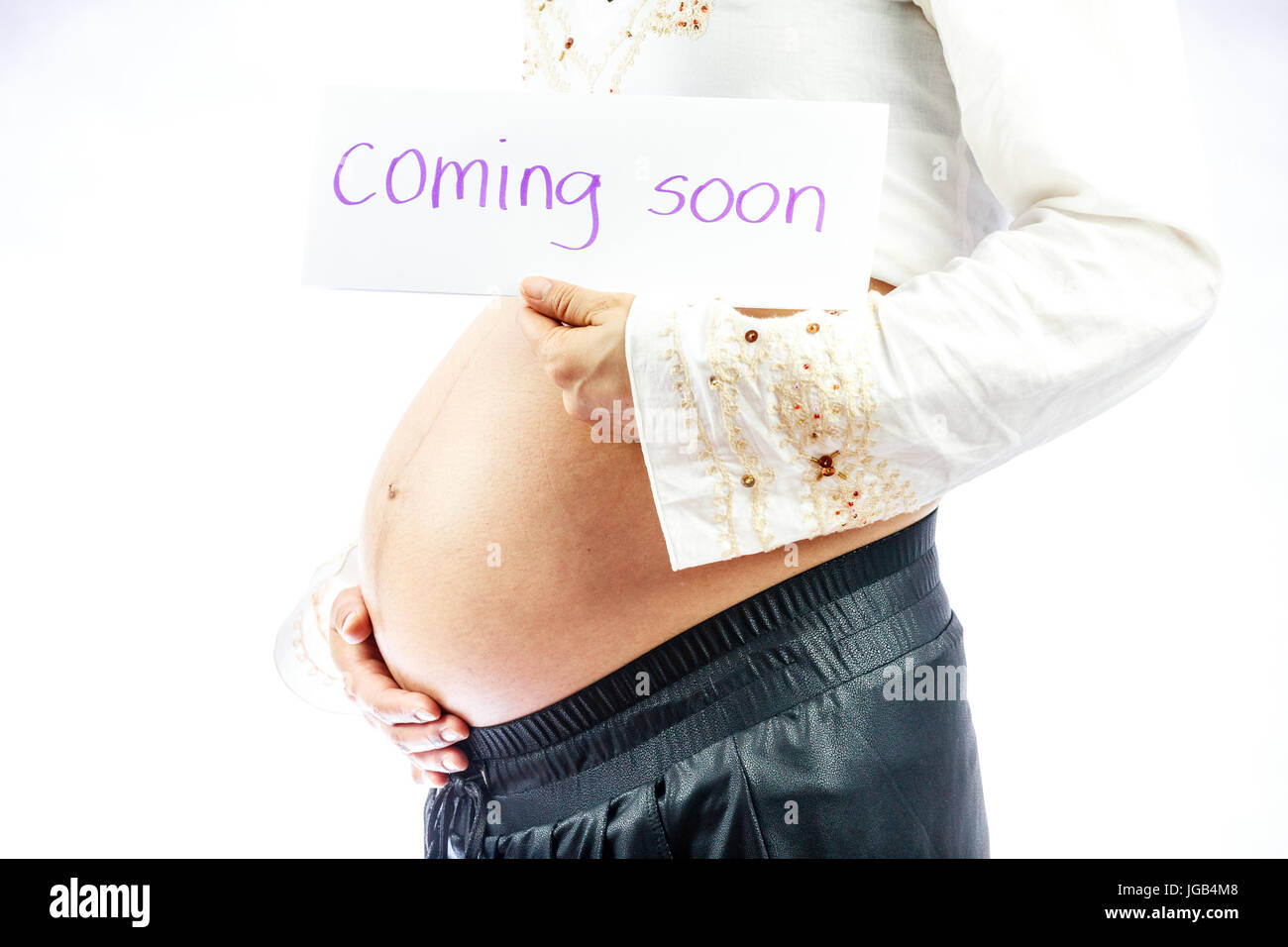 Pregnant Woman Holding Sign Concernant Son Bebe A Venir Photo Stock Alamy