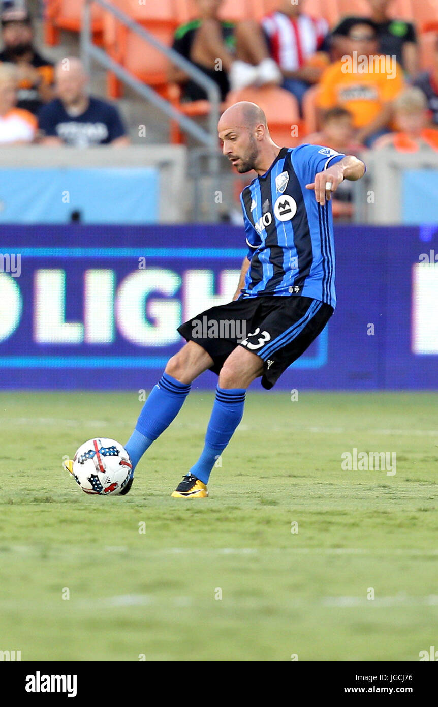 Houston, TX, USA. 05 juillet, 2017. Défenseur de l'Impact de Montréal Laurent Ciman (23) passe à un coéquipier au cours de la première moitié de la saison régulière MLS Houston Dynamo match entre l'Impact de Montréal et du stade BBVA Compass à Houston, TX. Image Crédit : Erik Williams/Cal Sport Media. Credit : csm/Alamy Live News Banque D'Images