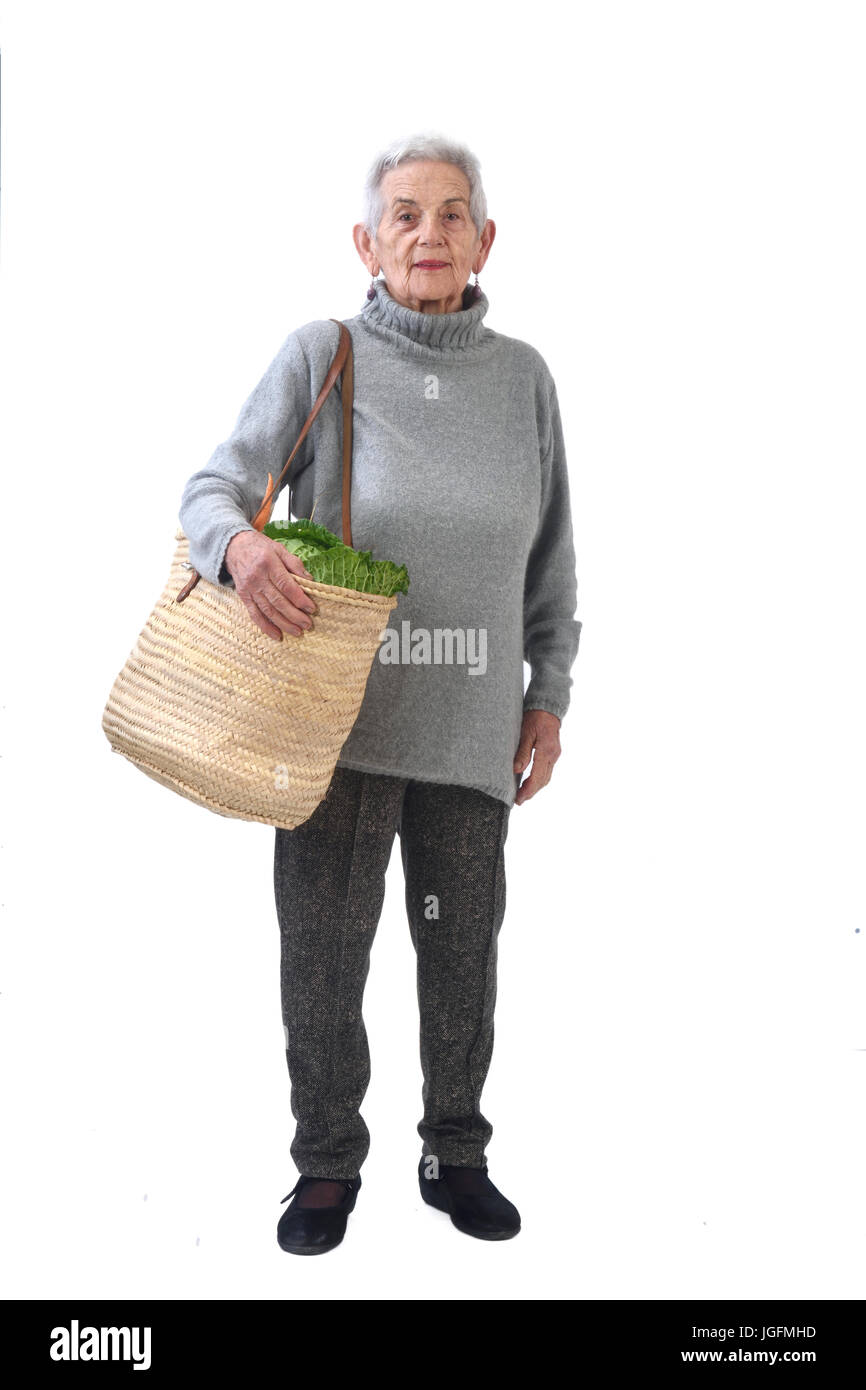 Senior woman with shopping cart Banque D'Images