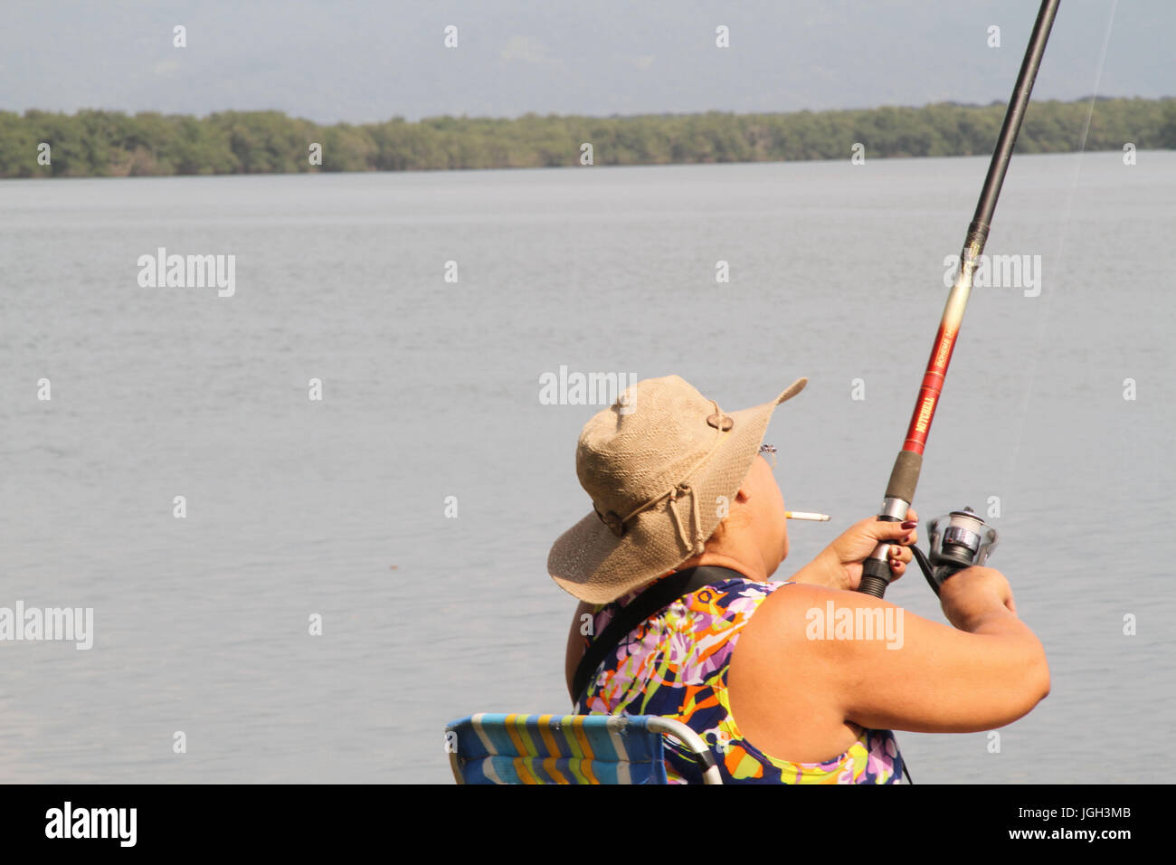 La canne à pêche ; personnes ; ; ; 2014 Portinho Praia Grande ; la côte Paulista de São Paulo ; Brésil. Banque D'Images