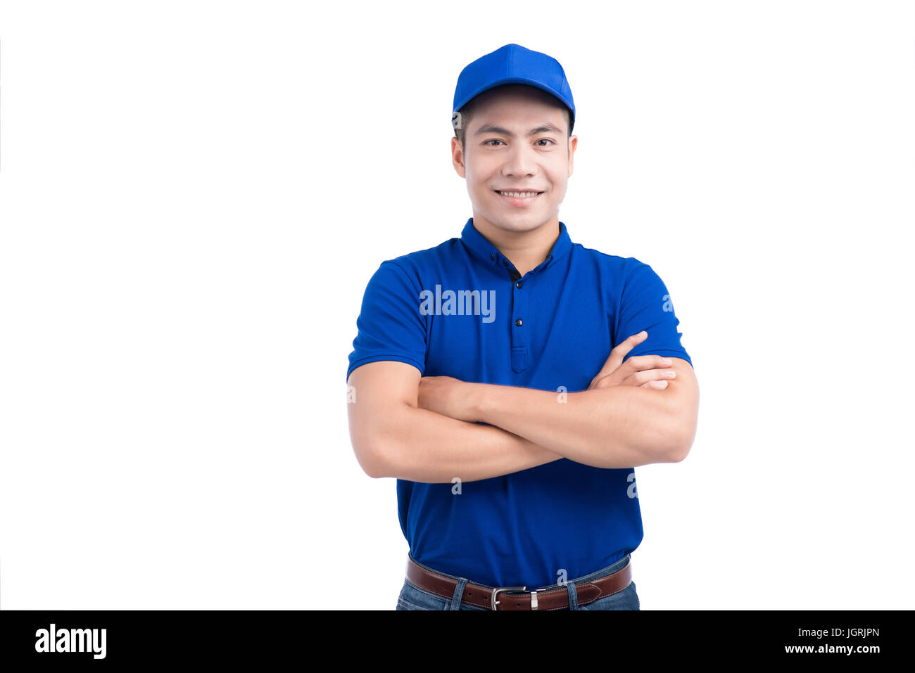 L'Homme asiatique en uniforme bleu. Arrière-plan blanc. Banque D'Images