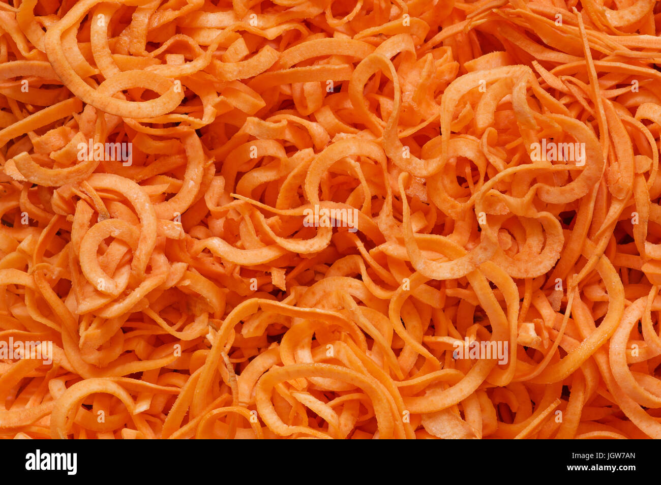 Image en arrière-plan des morceaux de patates douces coupées en spirale Banque D'Images