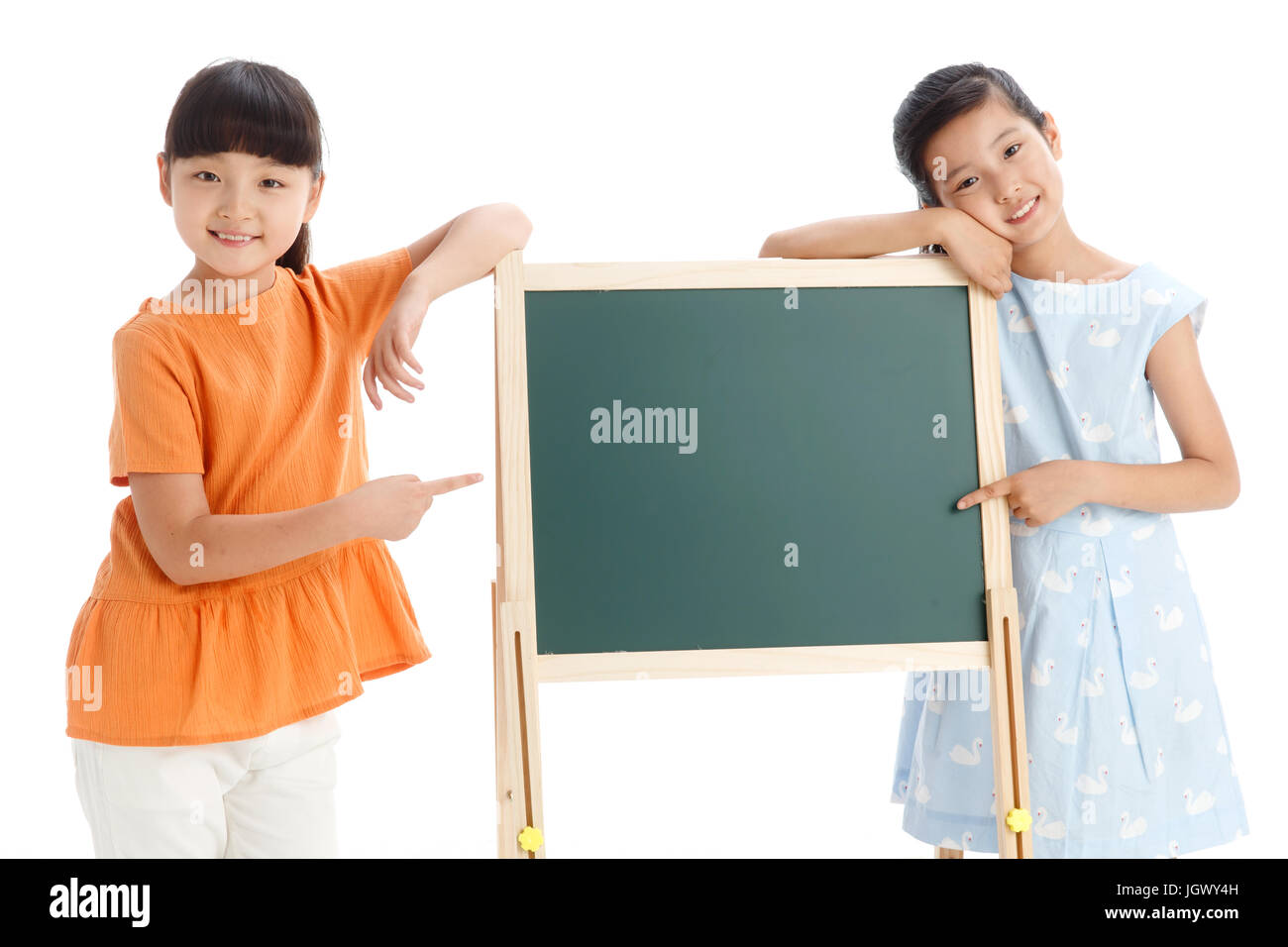 Deux filles de l'école de planche à dessin avec Banque D'Images