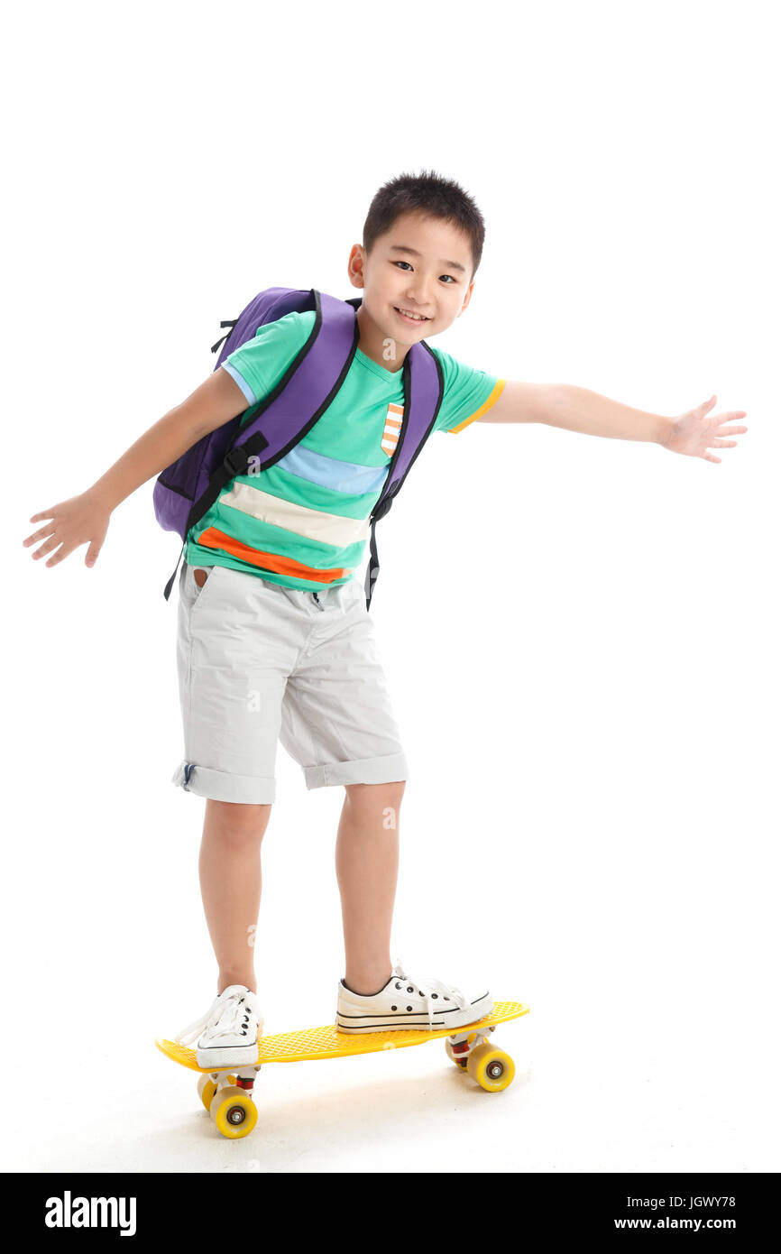 Portrait of boy with skateboard Banque D'Images