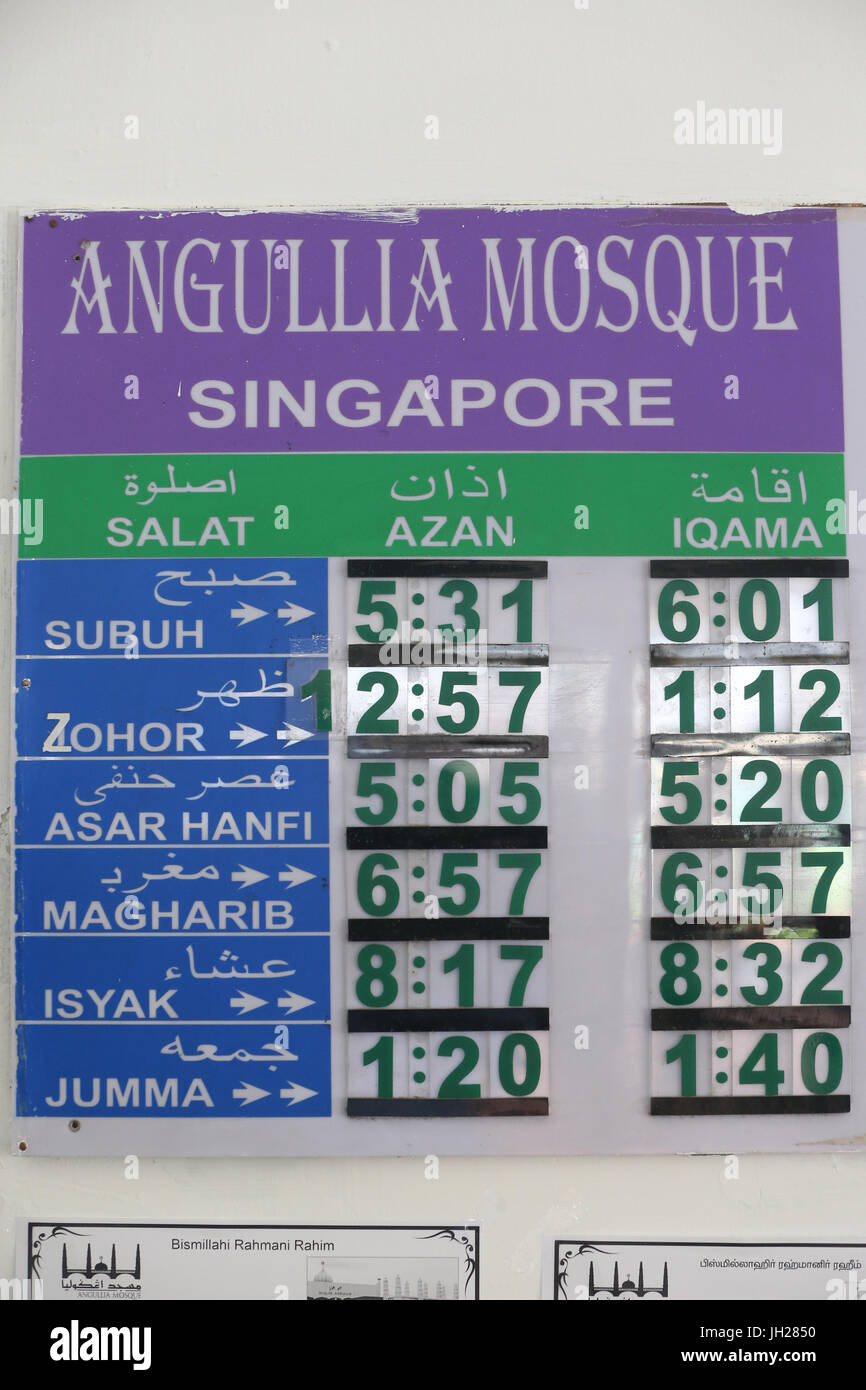 Horloges indiquant l'heure toutes les prières des musulmans.Salat. Singapour. Banque D'Images