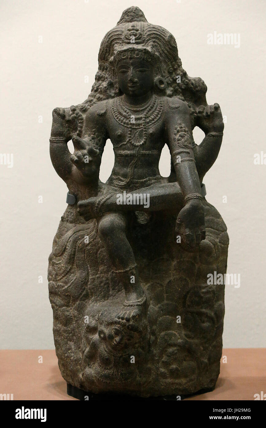 Le Victoria and Albert Museum. Comme Shiva Dakshinamurti. 1200-1300. La fin de période Chola. Le Granit. Le sud de l'Inde (Tamil Nadu). United Kingdom. Banque D'Images