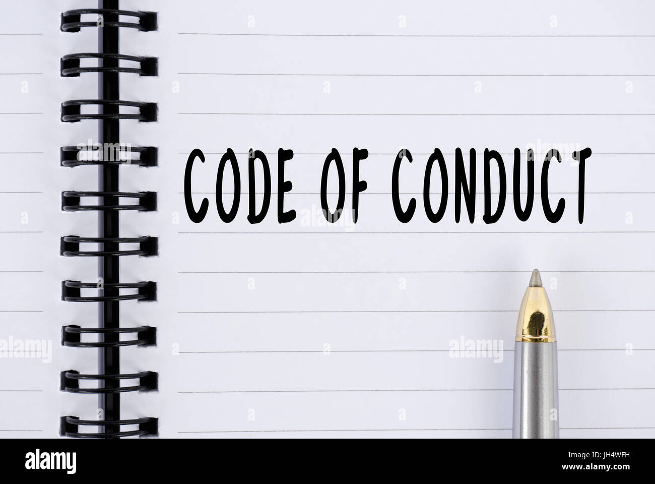 Code de conduite mot sur le bloc-notes avec stylo Banque D'Images