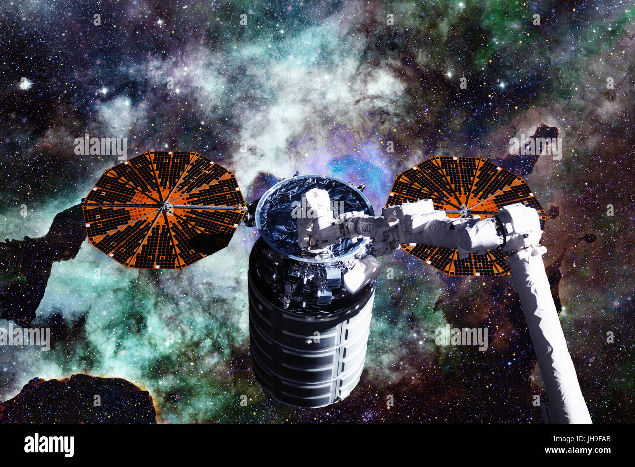 Vaisseaux Cargo - Le véhicule de transfert automatique sur galaxie spirale. Éléments de cette image fournie par la NASA. Banque D'Images