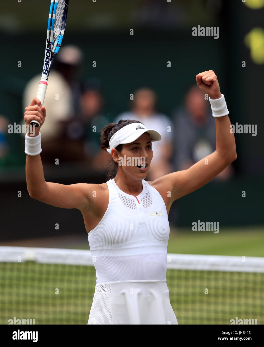 Garbine Muguruza célèbre d'atteindre la finale de Wimbledon féminin avec une demi-finale 6-1 6-1 victoire contre Magdalena Rybarikova au jour 10 de la Wimbledon à l'All England Lawn Tennis et croquet Club, Wimbledon. Banque D'Images
