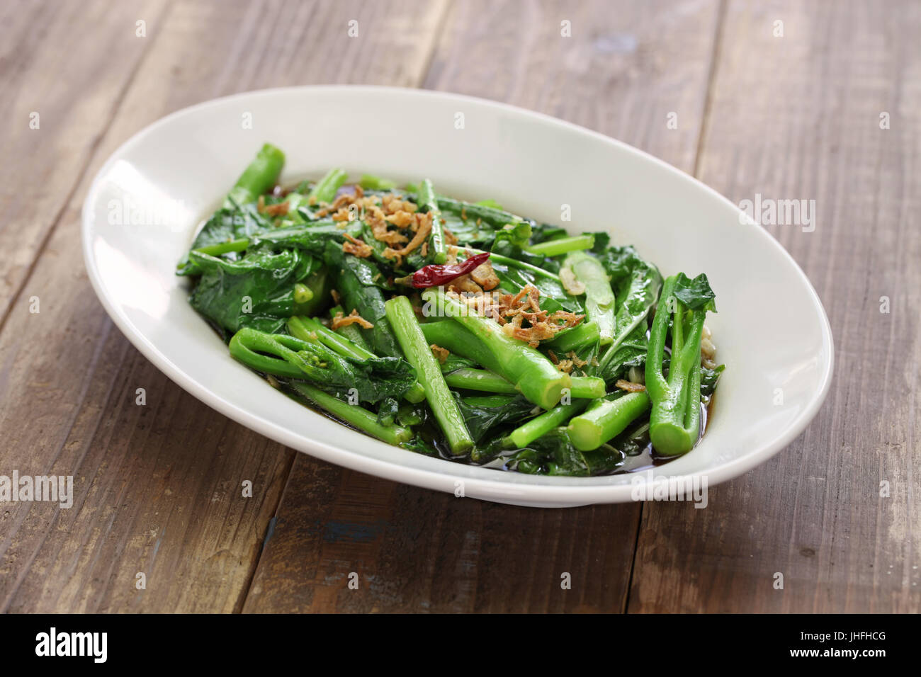 Sauté de chou chinois(le brocoli chinois) à la sauce d'huître Banque D'Images