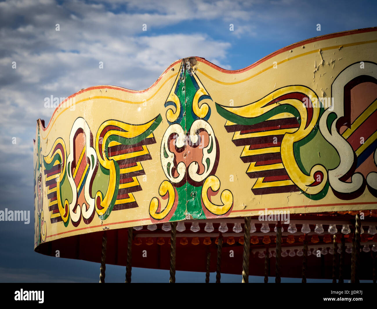Carrousel de foire détail dans la station balnéaire de Llandudno, le Nord du Pays de Galles, Royaume-Uni Banque D'Images
