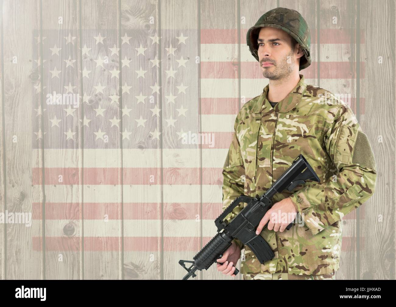 Soldat Fier 3d'arme à feu contre holding american flag Banque D'Images