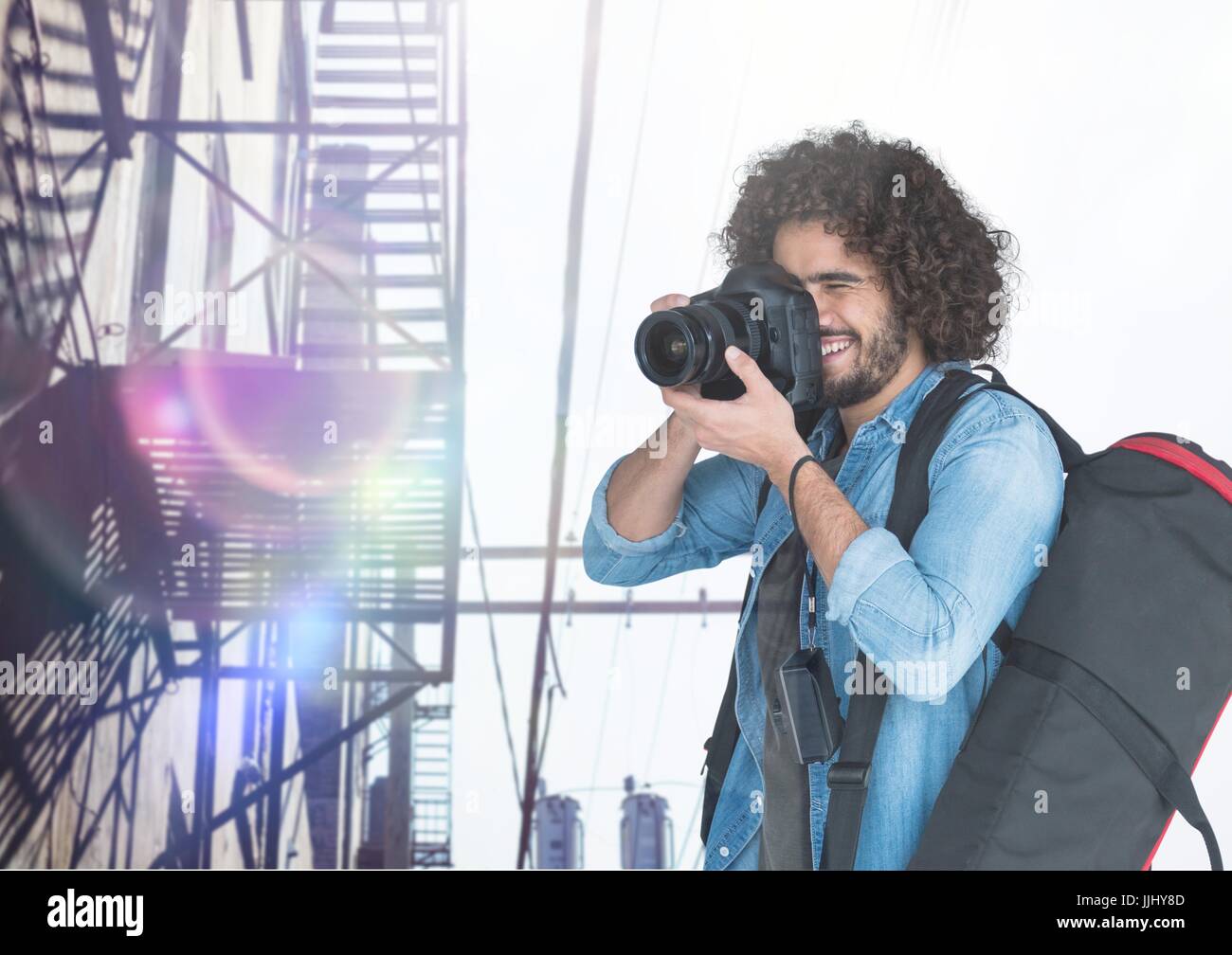 Photo photographe contre un escalier extérieur Banque D'Images