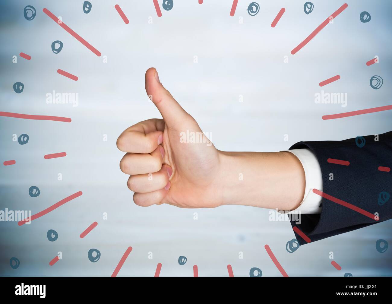 Hand giving Thumbs up contre panneau bleu flou et rouge bleu d'artifice doodle Banque D'Images