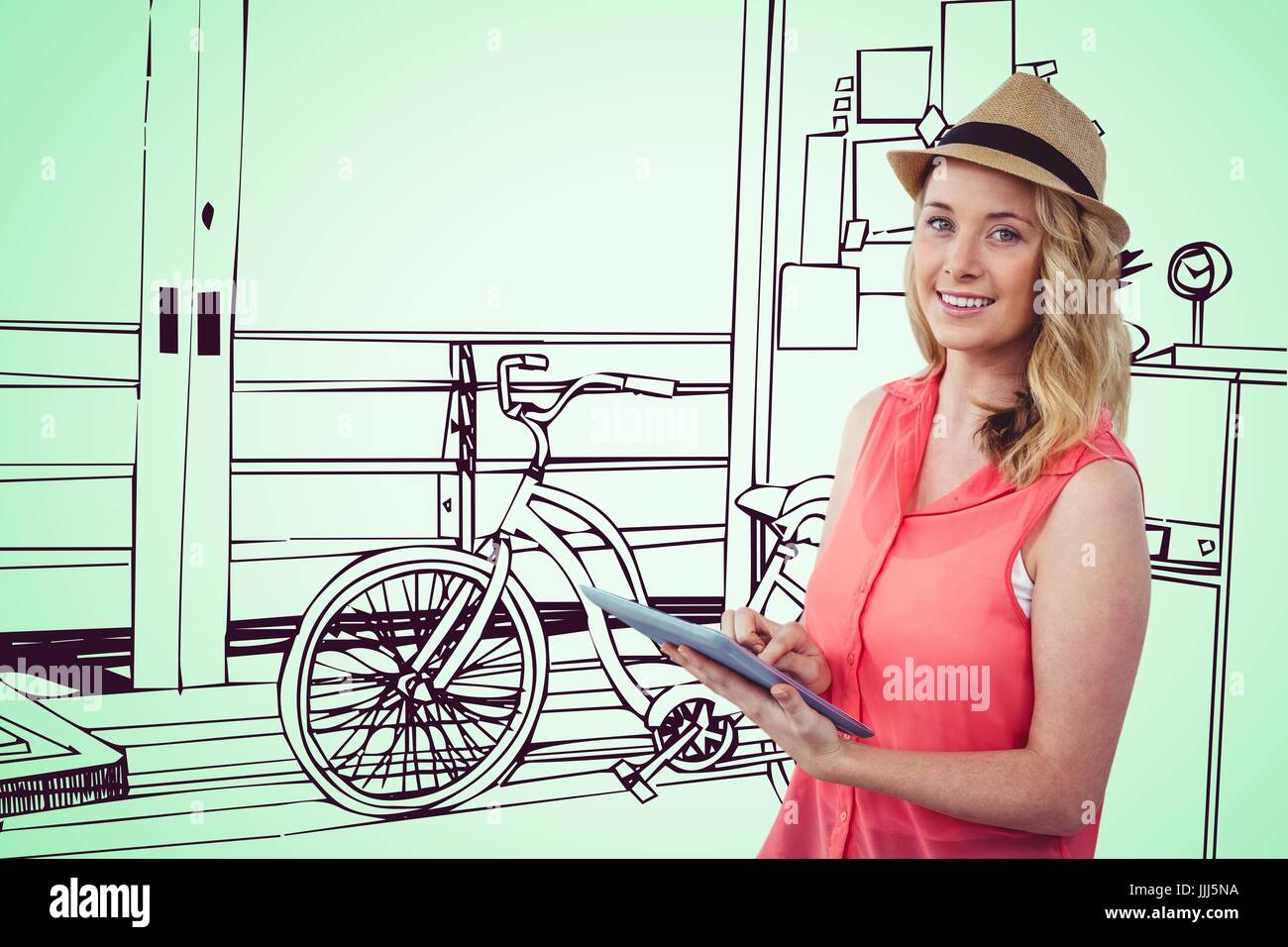 Smiling blonde woman using a digital tablet avec un dessin 3D image sur fond vert Banque D'Images