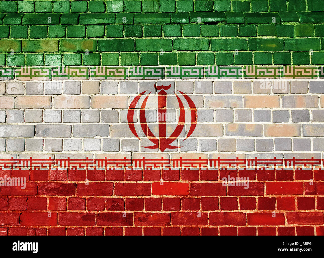 Drapeau iranien sur un vieux mur de brique background Banque D'Images