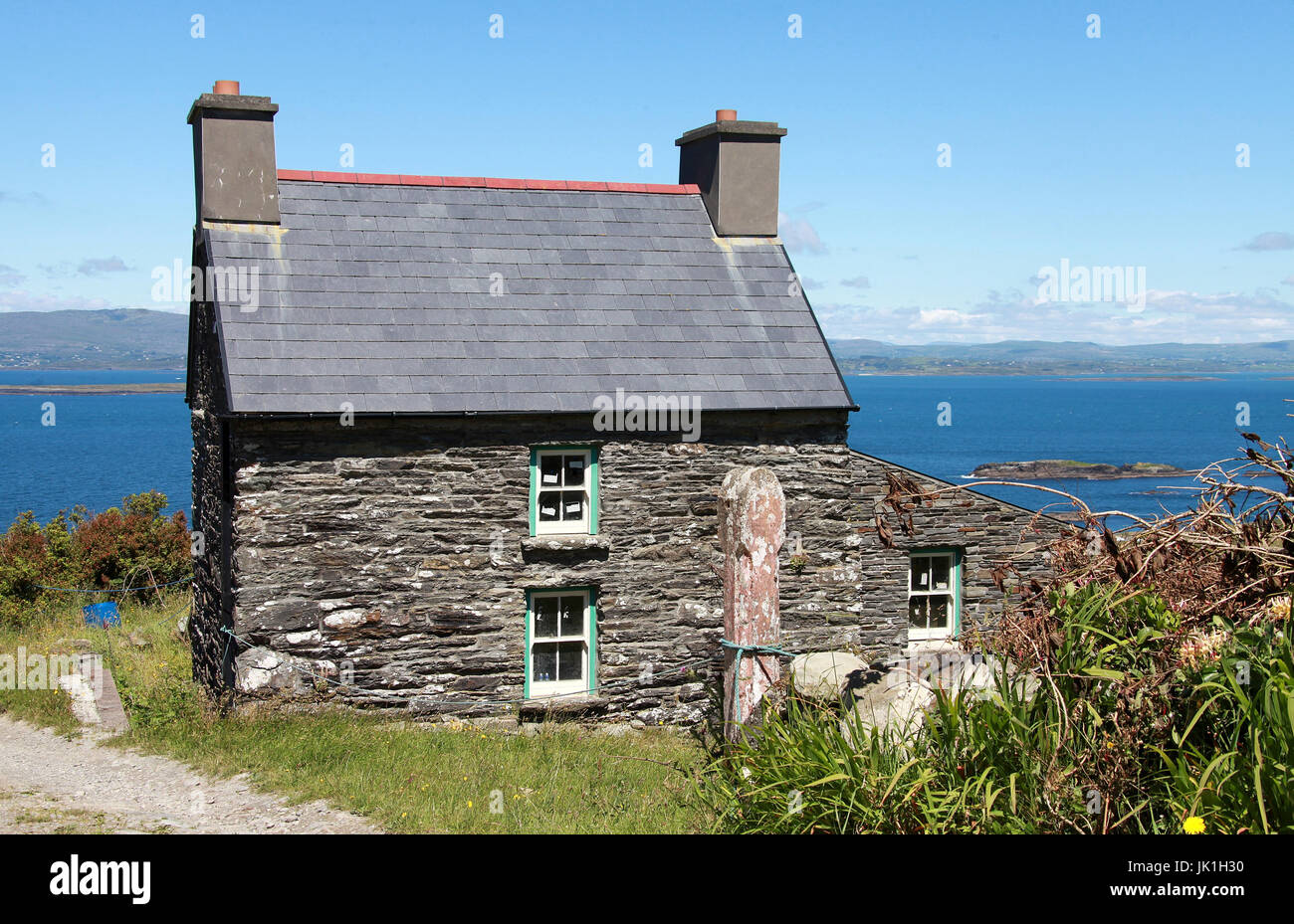 Petite maison en pierre sur Cape Clear Island dans le comté de Cork Banque D'Images