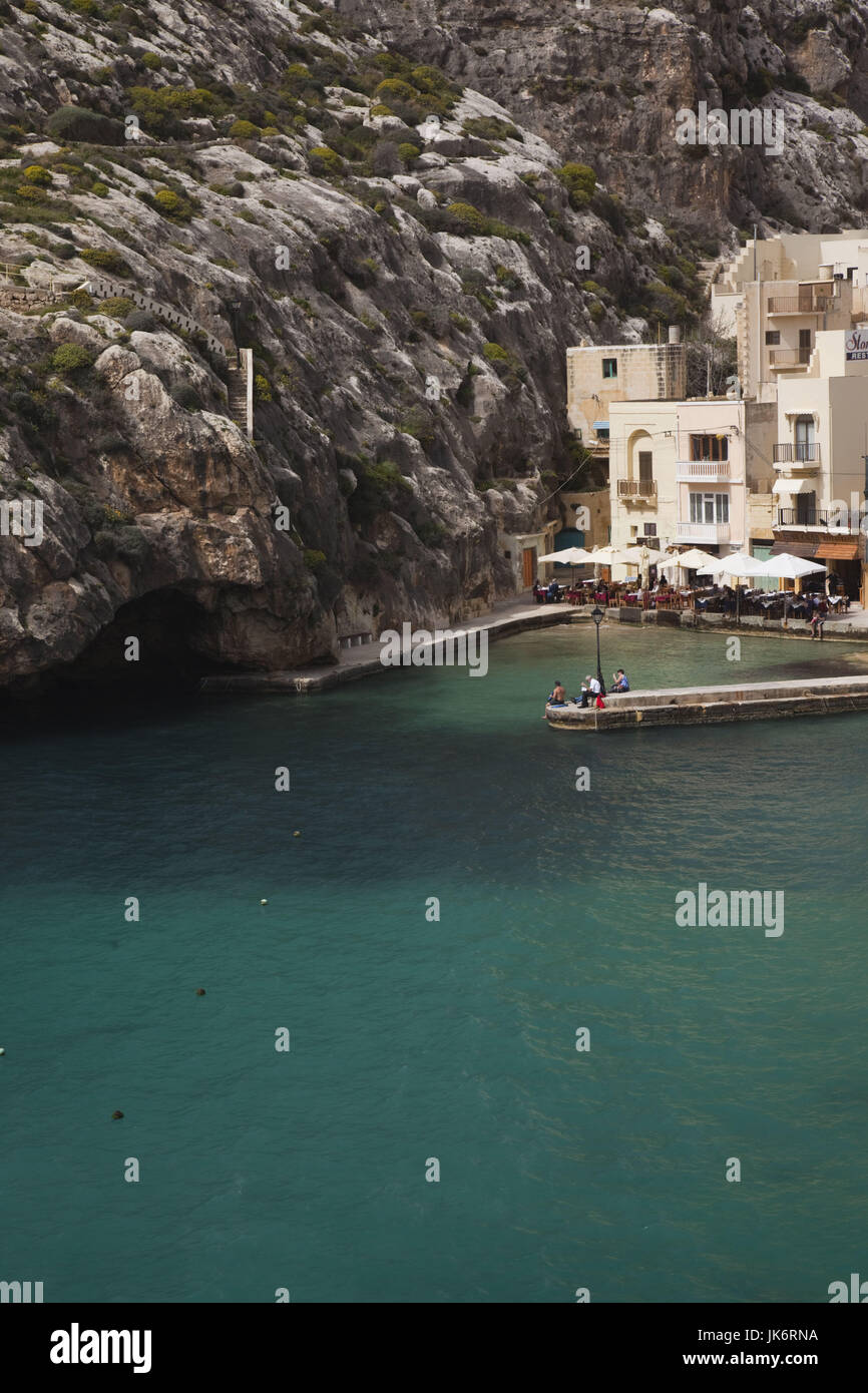 Malte, Gozo Island, Xlendi, cafés et d'hôtels à Xlendi Bay Banque D'Images