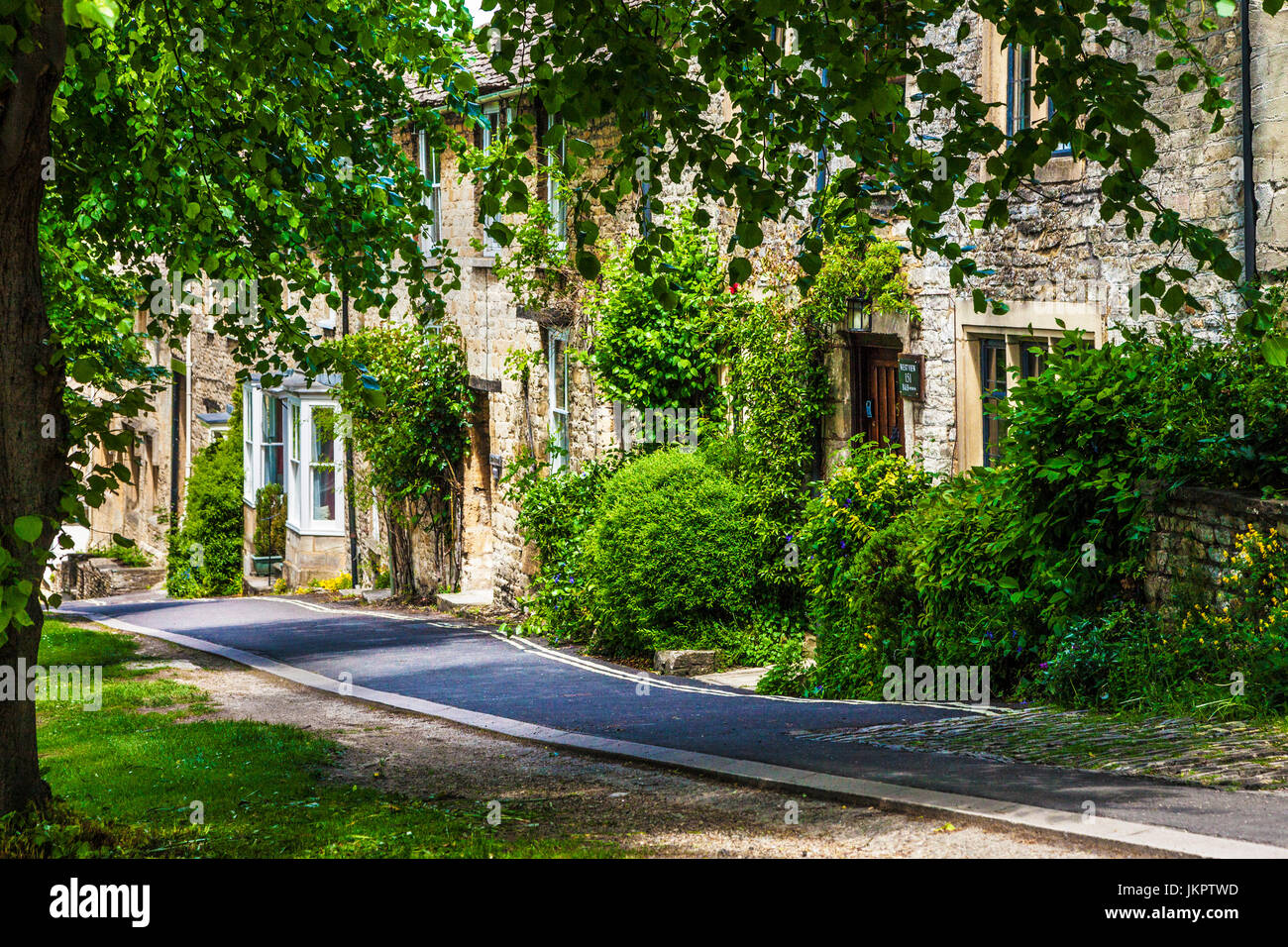 Jolie maison en pierre de Cotswold dans le village de Burford Cotswolds dans l'Oxfordshire. Banque D'Images