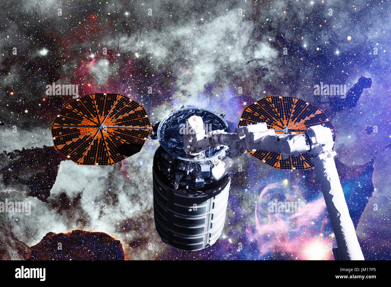 Vaisseaux Cargo - Le véhicule de transfert automatique sur galaxie spirale. Éléments de cette image fournie par la NASA. Banque D'Images