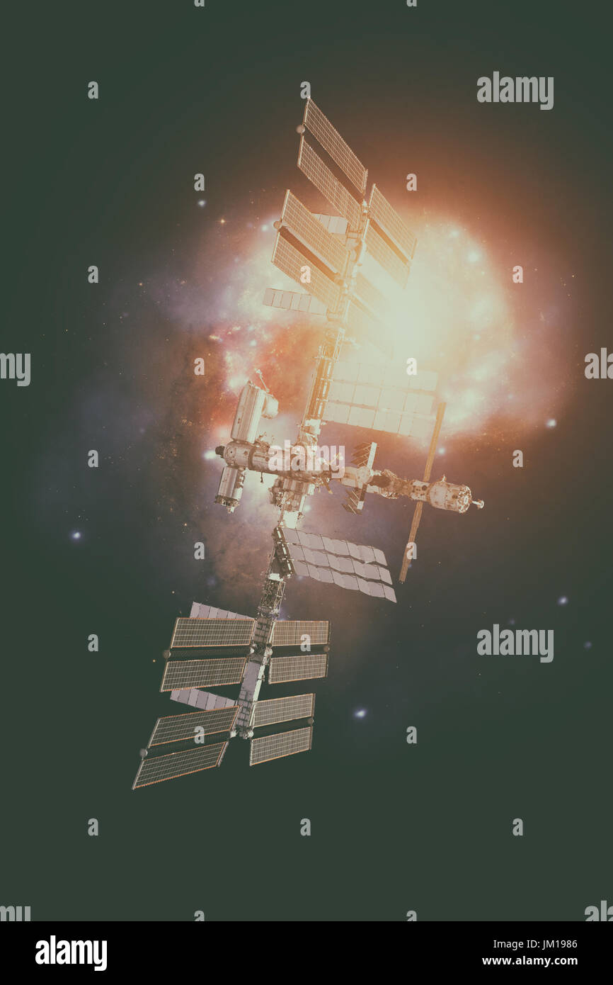 Station spatiale internationale plus de galaxie spirale terre. Éléments de cette image fournie par la NASA. Banque D'Images