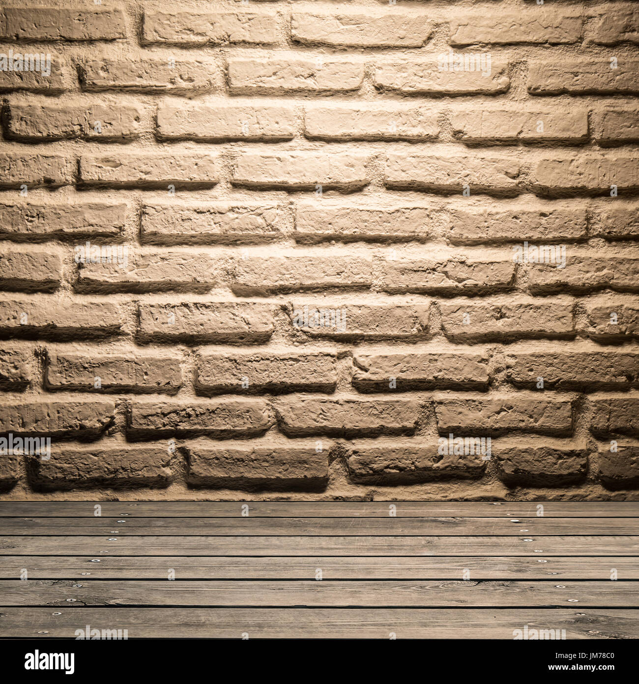 Mur de brique sur fond blanc, plancher en bois Banque D'Images