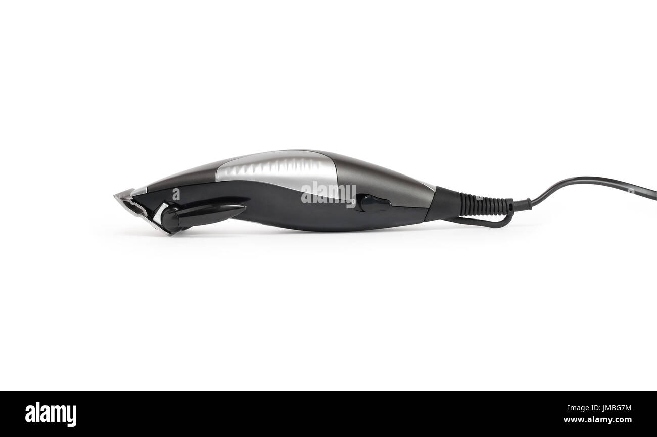 Tondeuse à cheveux électrique moderne avec cable sur fond blanc. Chemin de détourage est inclus Banque D'Images