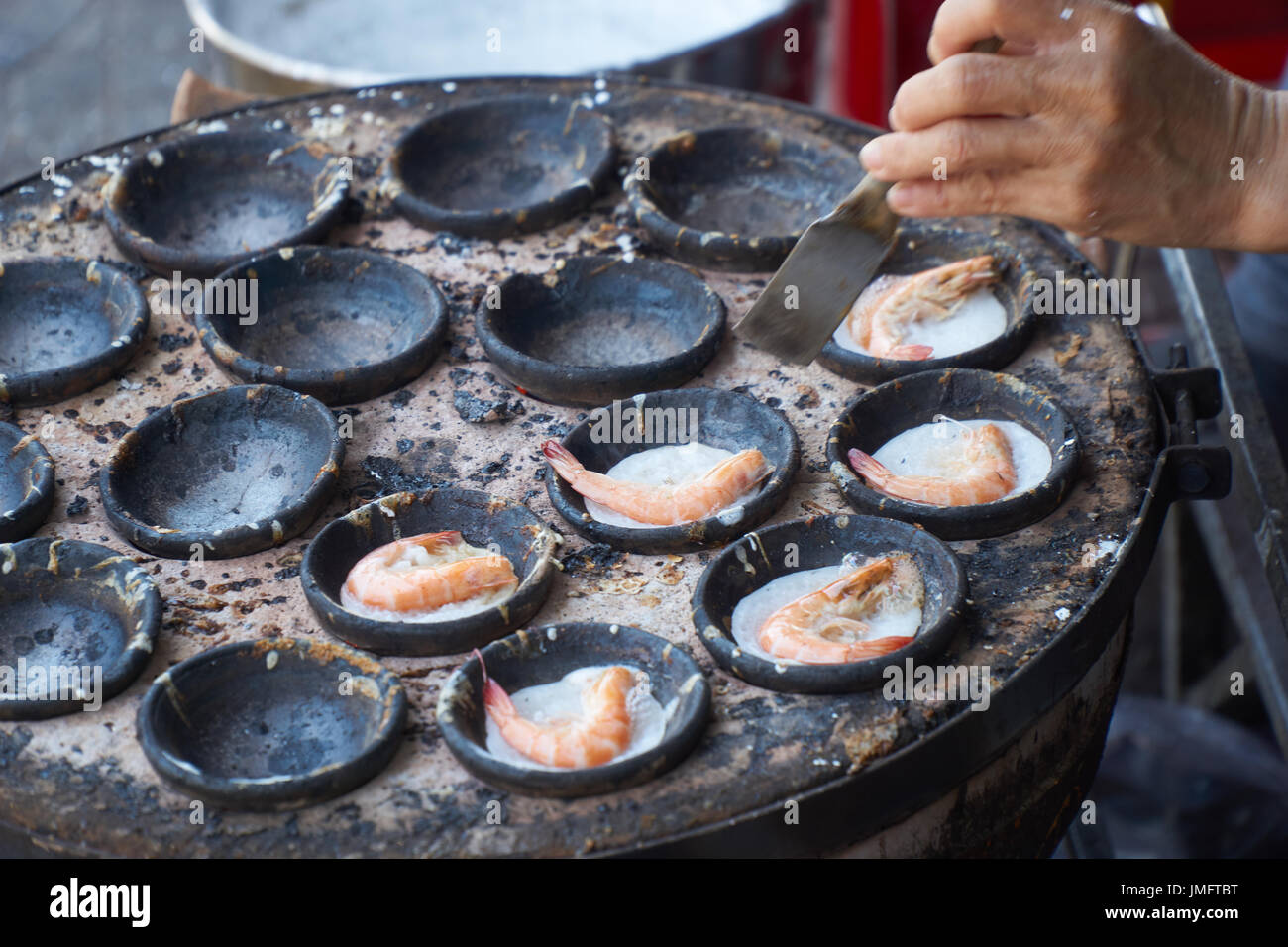 La cuisson des aliments traditionnels vietnamiens à Nha Trang, Vietnam. Banque D'Images