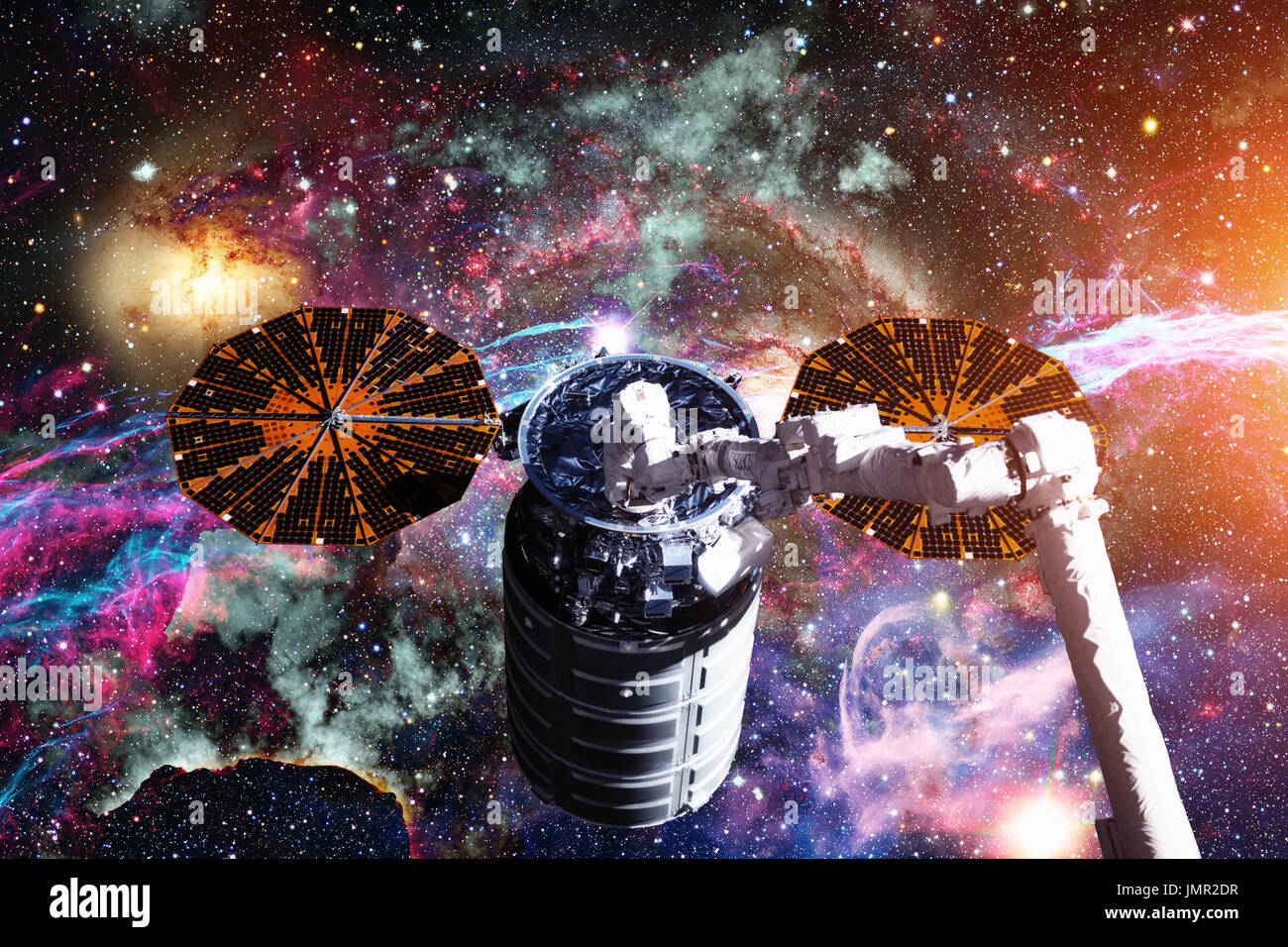 Vaisseaux Cargo - Le véhicule de transfert automatique sur galaxie spirale. Éléments de cette image fournie par la NASA. Banque D'Images