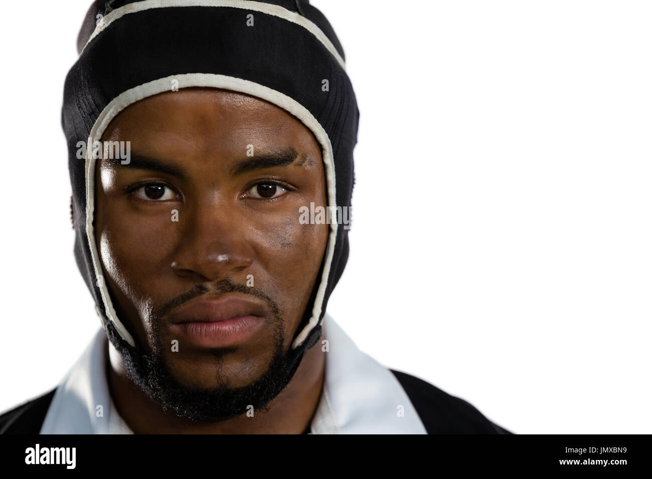 Close up portrait of male rugby player against white background Banque D'Images