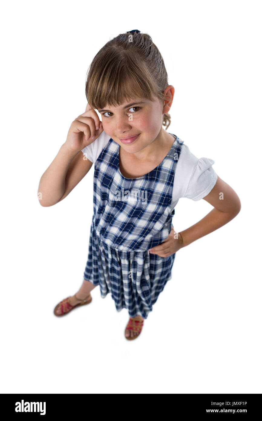 Vue aérienne de cute girl posing on white background Banque D'Images