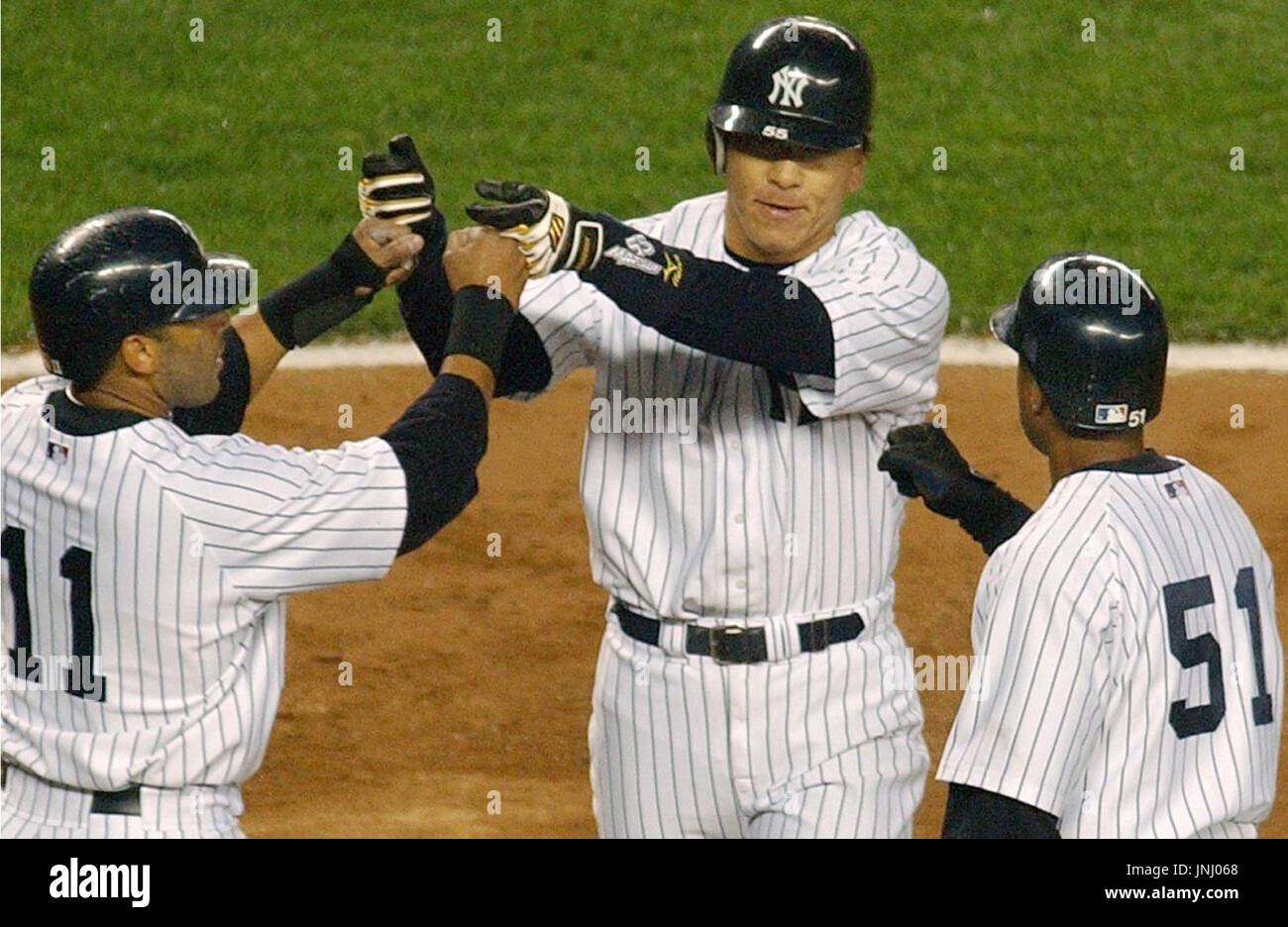 New York Yankees' Gary Sheffield, right, holds his son Jaden Amir as he  talks to Reggie Jackson at Old-Timer's Day during MLB baseball Saturday,  June 24, 2006 at Yankee Stadium in New