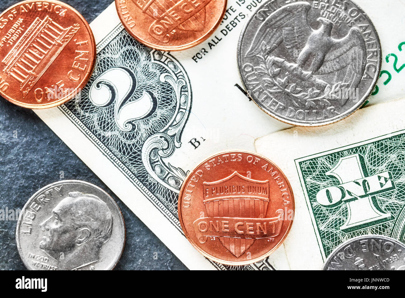 Close up photo du dollar des États-Unis billets et pièces, faible profondeur de champ. Banque D'Images