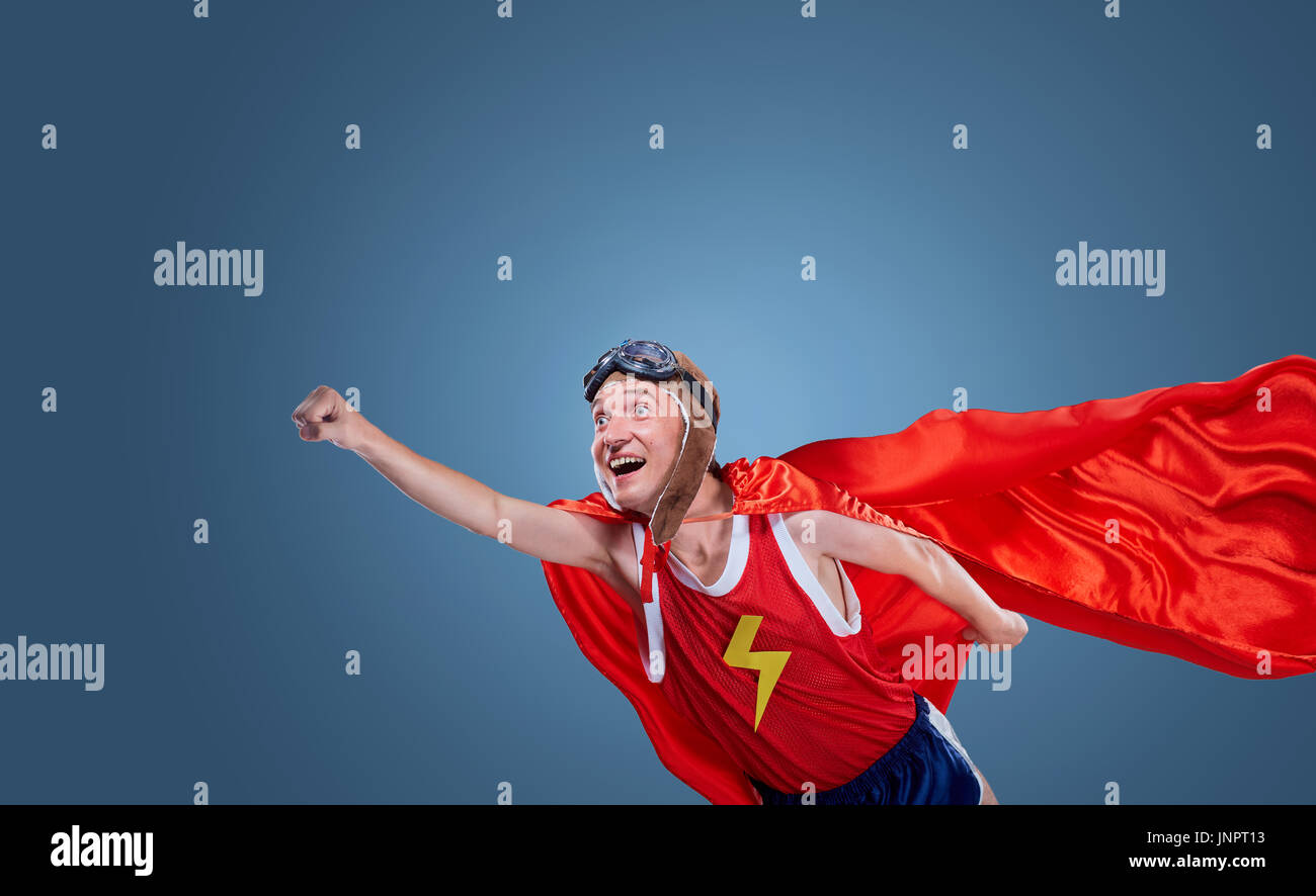 Un drôle de super héros vole Banque D'Images