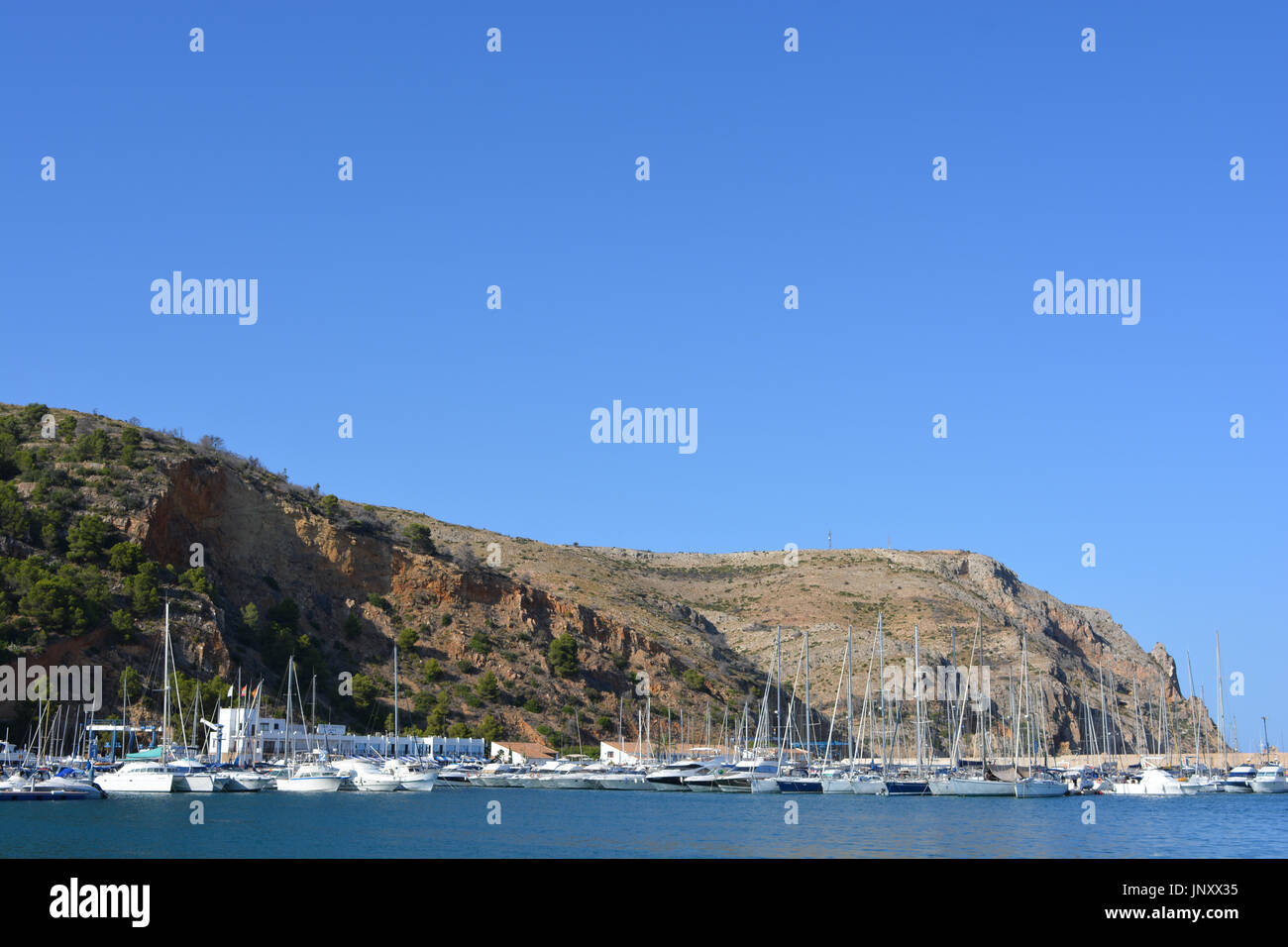 Yachts amarrés dans le club nautique de Javea, un yacht club / marina à Javea sur la Costa Blanca, Espagne. Banque D'Images