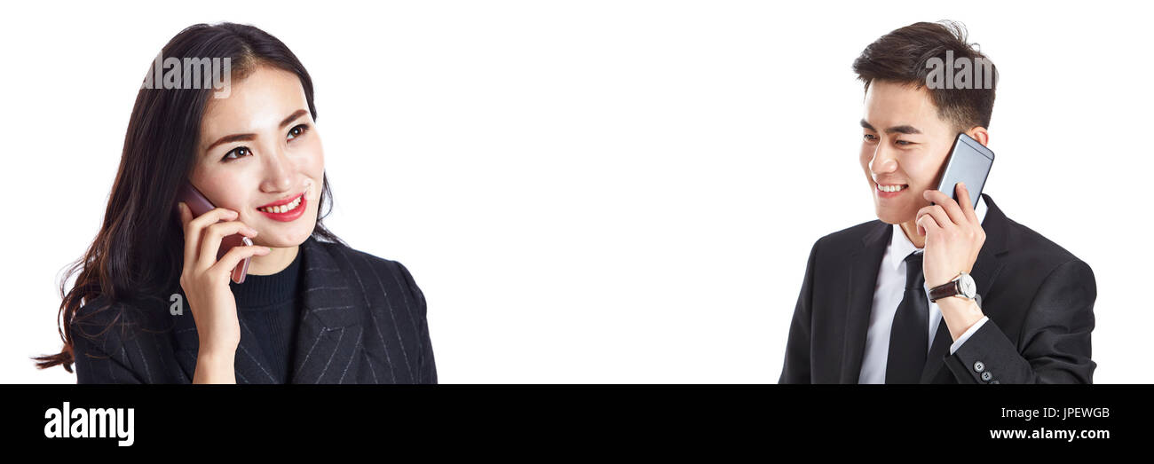 Young Asian business man and woman talking on mobile phone, isolé sur fond blanc. Banque D'Images