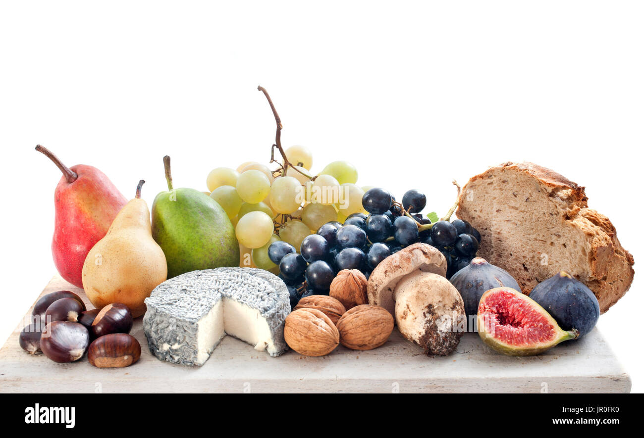 Fruits et fromage in front of white background Banque D'Images
