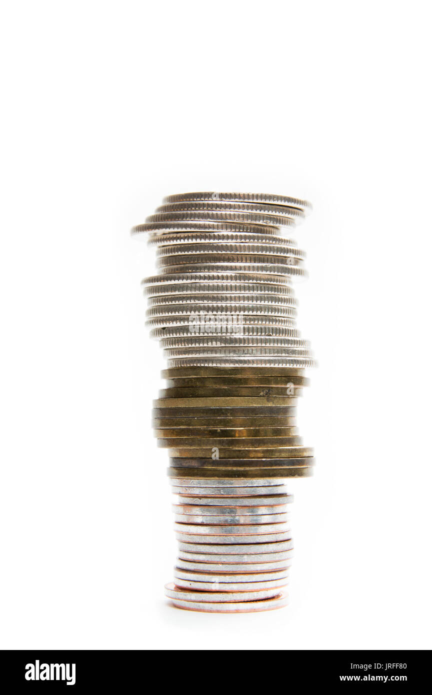 Pièces de monnaie sur le fond blanc Banque D'Images