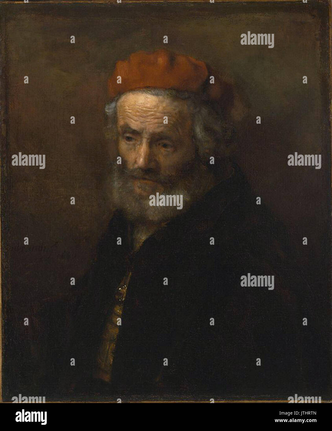 Portrait de Rembrandt d'un vieil homme dans un chapeau rouge Banque D'Images