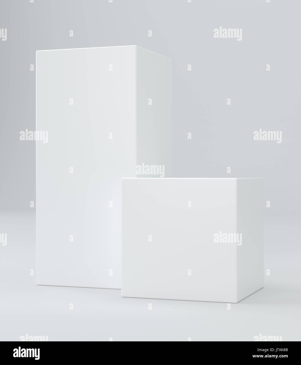 Deux cubes blancs sur fond gris. Le rendu 3d. Banque D'Images