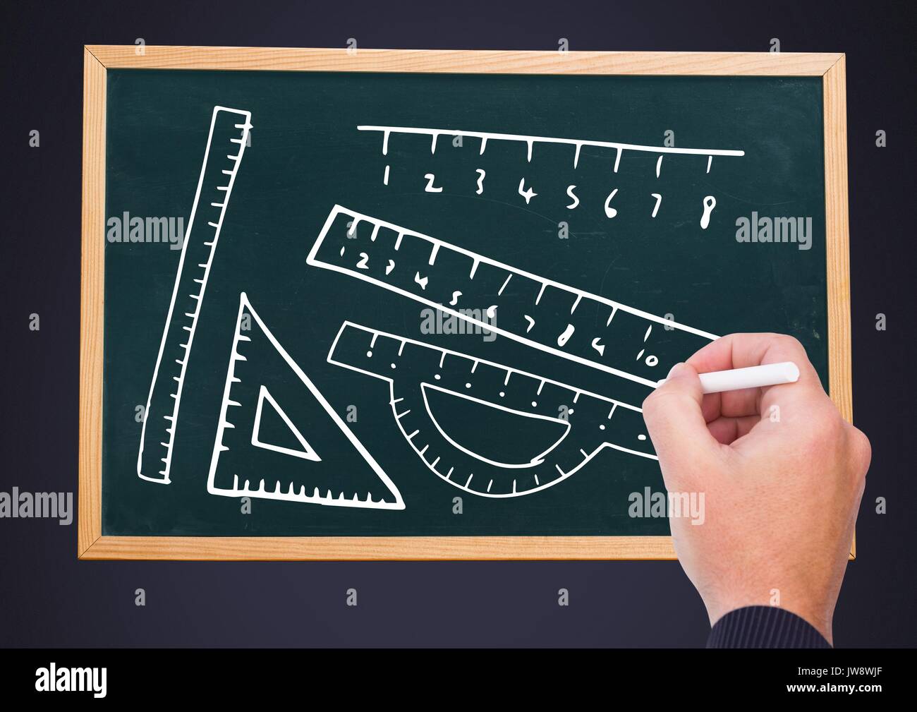 Digital composite de dessin à la main les règles on blackboard Banque D'Images