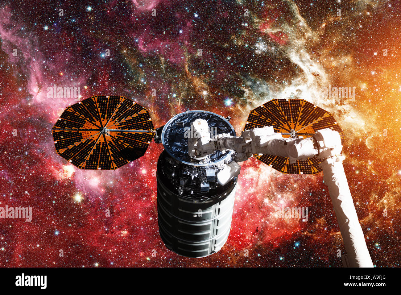 Vaisseaux Cargo - Le véhicule de transfert automatique sur galaxie spirale. Éléments de cette image fournie par la NASA. Banque D'Images