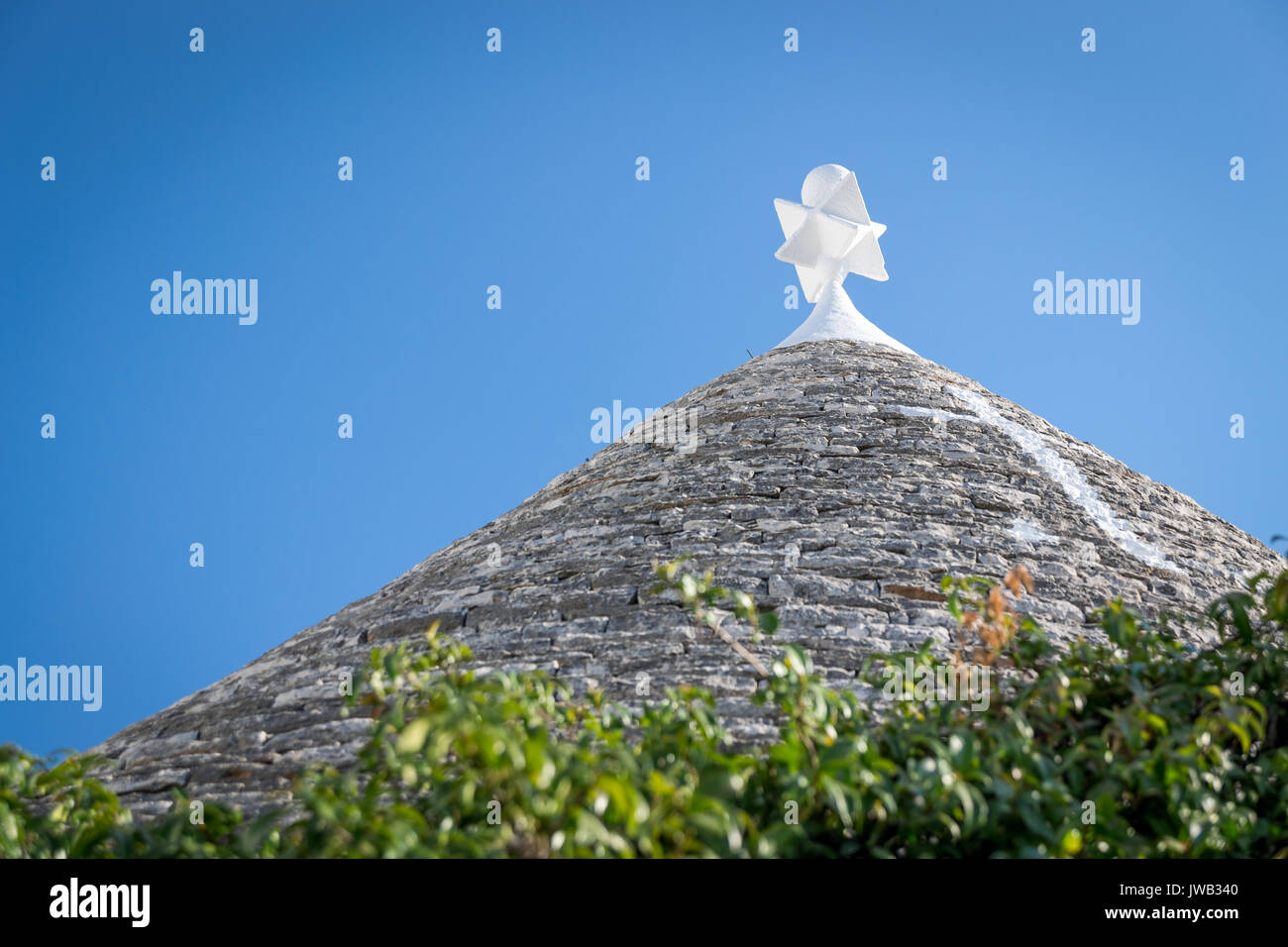 Détail de la toiture d'un trullo typique d'Alberobello (Italie). Le format paysage. Banque D'Images
