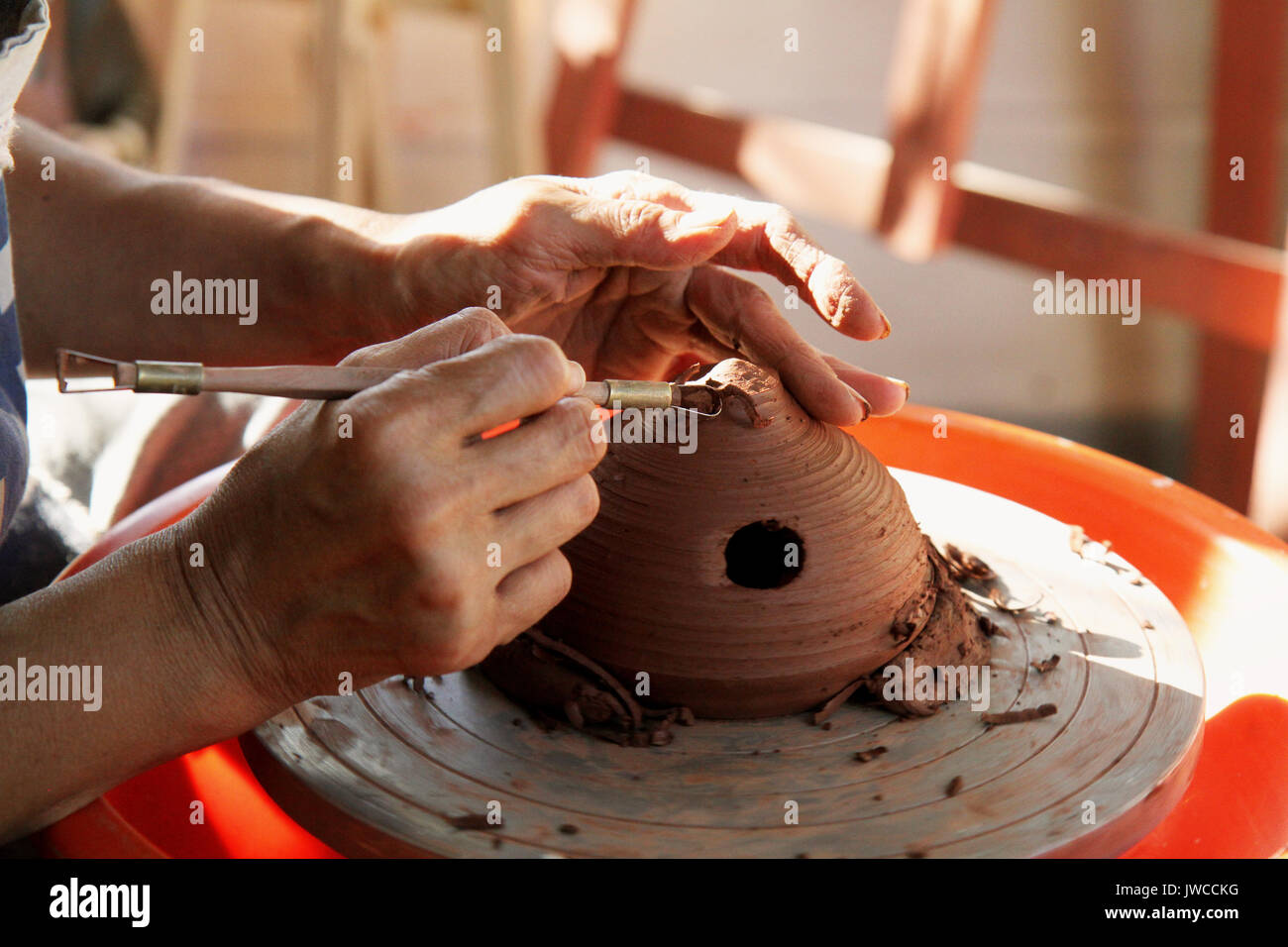 Pot en mains Banque D'Images