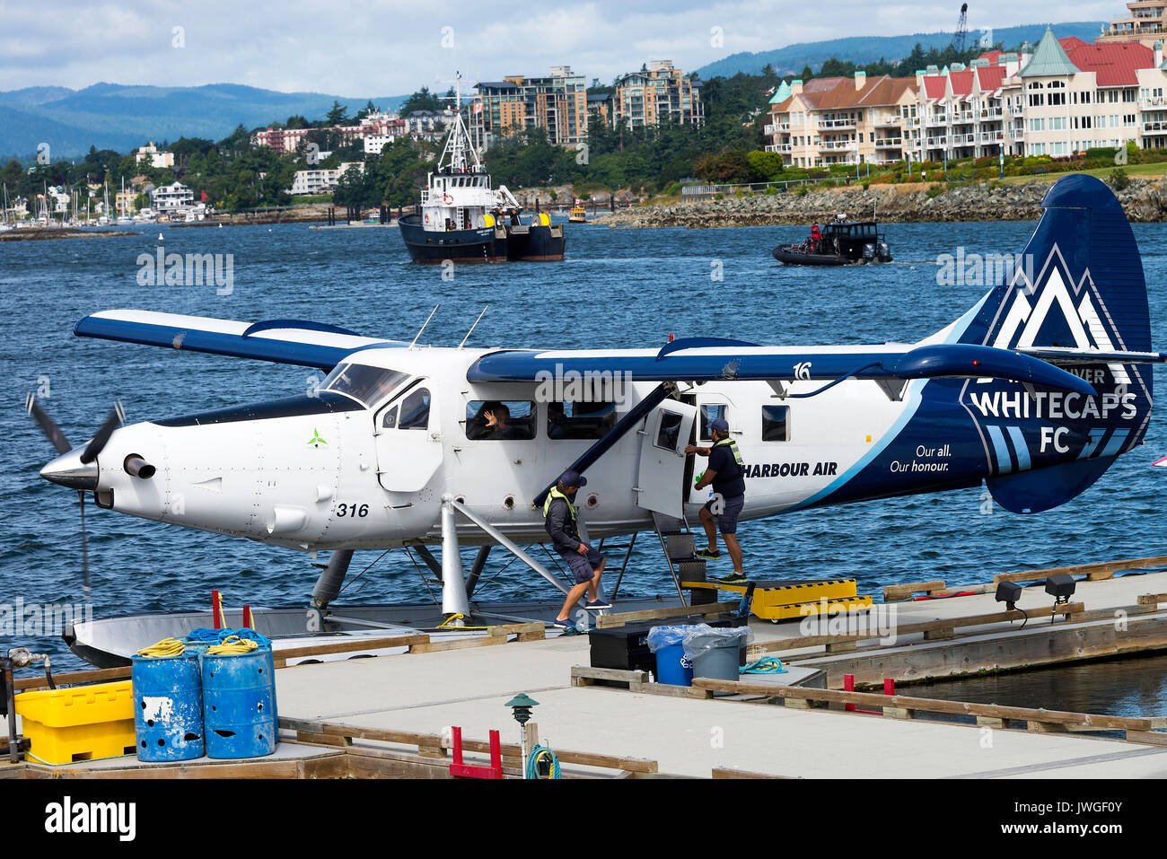 Dans les hydravions coloré port intérieur de Victoria avec des bateaux et ferries sur l'île de Vancouver, British Columbia Canada Banque D'Images