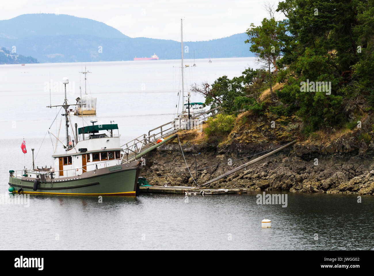 Bateau Yacht Cutter Rock à quai privé dans les Butchart Cove de Butchart Gardens Vancouver Island British Columbia Canada Banque D'Images
