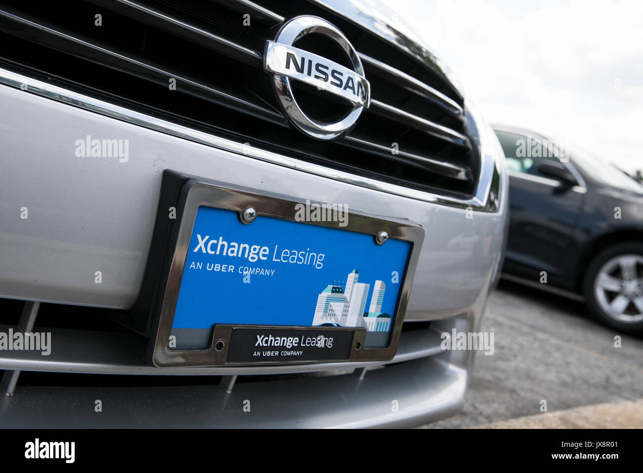 Signe d'un logo et de véhicules en dehors d'un établissement occupé par Xchange Leasing, une filiale de la société de covoiturage, Uber à Nottingham, Maryland sur une Banque D'Images