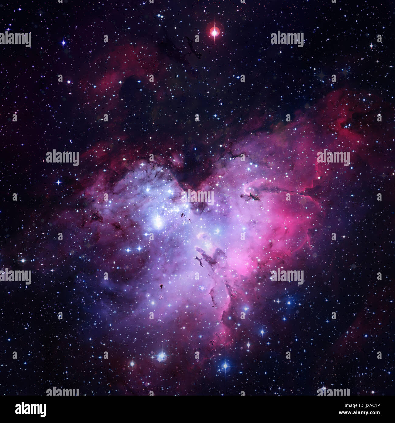 La Nébuleuse de l'Aigle, ou Messier 16. Au centre, le soi-disant piliers de la création peut être vu. Éléments de cette image fournie par la NASA. Banque D'Images